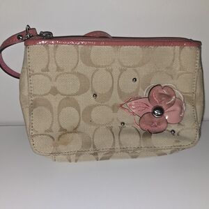 Coach Signature Beige Wristlet with Pink Floral Accent